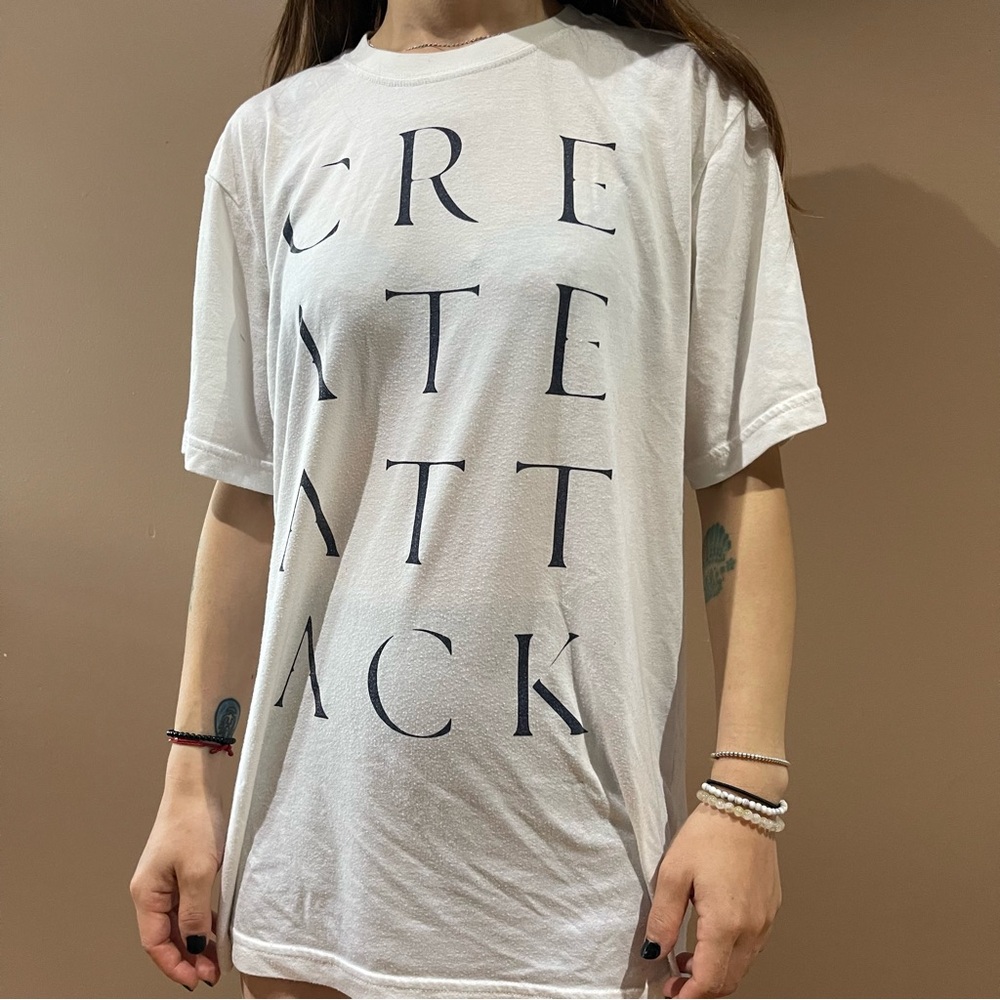Nike White Graphic Tee with Bold Text